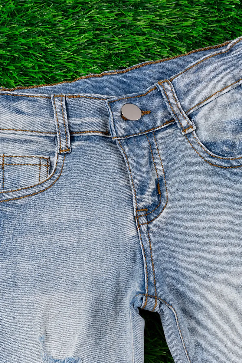 Super stretchy light blue skinny jeans w/distressed hem. PNG25153020-WENDY