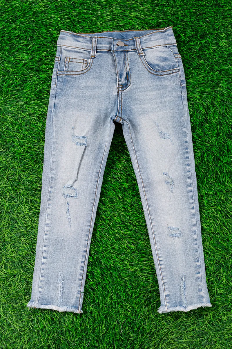 Super stretchy light blue skinny jeans w/distressed hem. PNG25153020-WENDY
